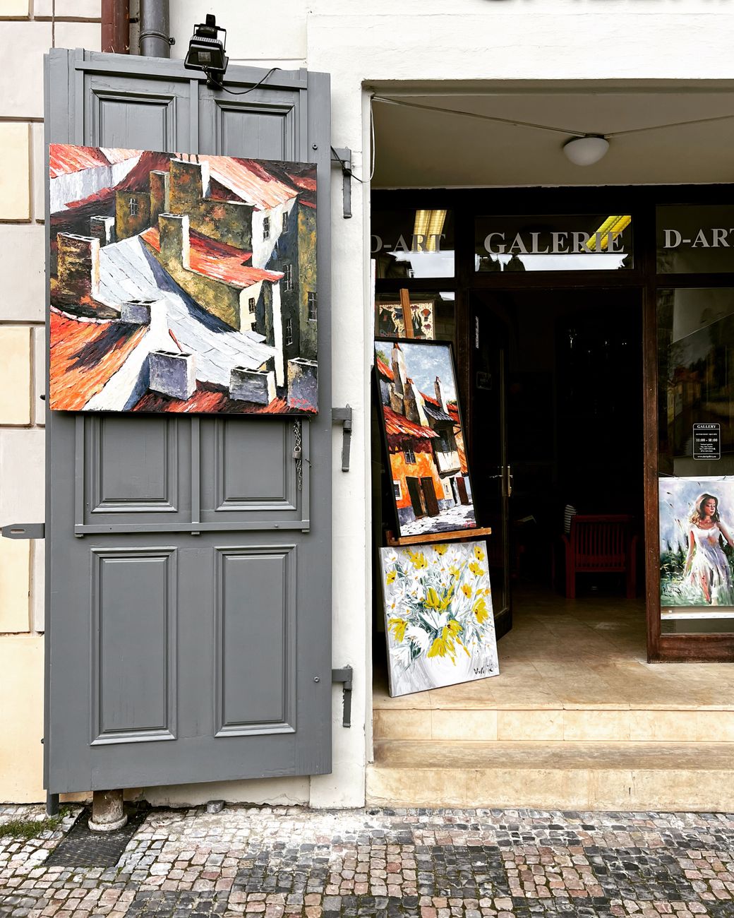 paintings at the entrance to an art gallery